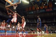 Michael Jordan battles for a rebound against Dion Glover
